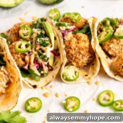 Crunchy Cauliflower Tacos with Smoky Chipotle Crema 10 My battered cauliflower tacos recipe with fresh slaw and smokey chipotle crema.