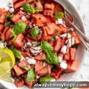 Overhead view of vegan watermelon feta salad in serving bowl
