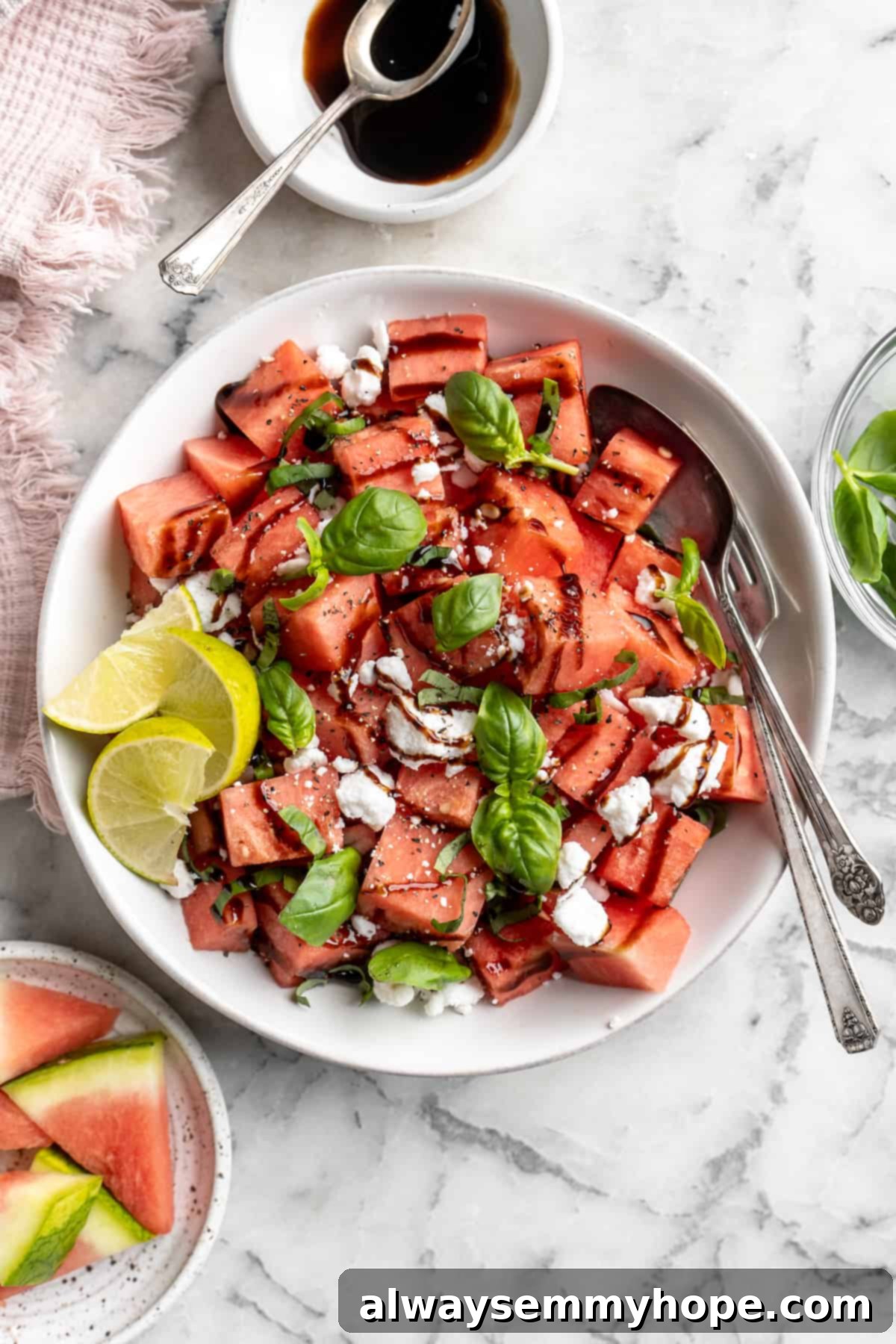 Overhead view of vegan watermelon feta salad in serving bowl