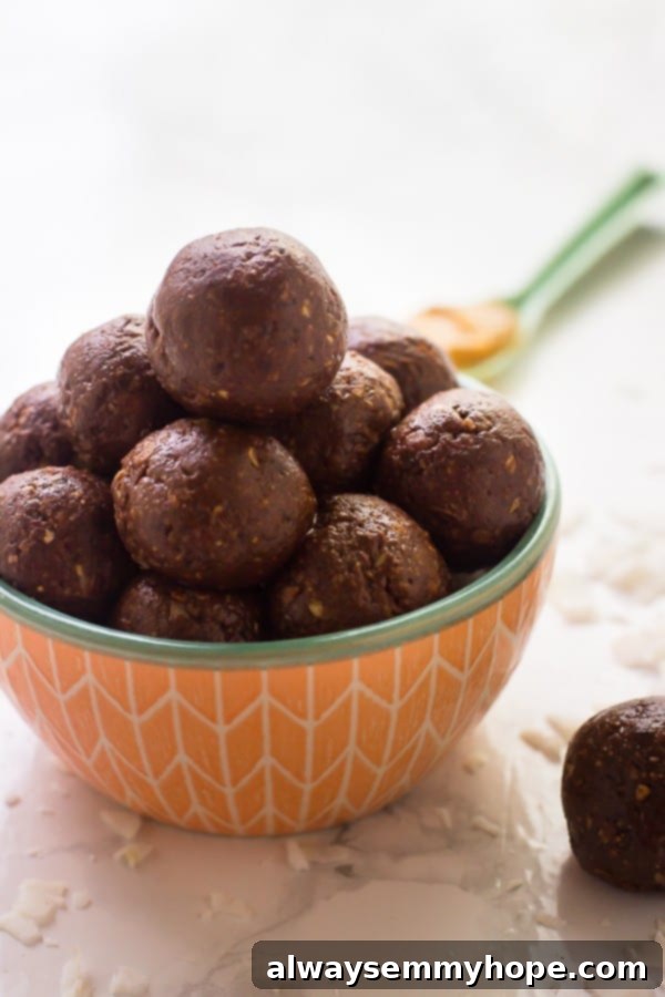 A bowl overflowing with freshly made, delicious peanut butter energy balls, perfect for a healthy snack.