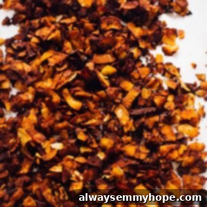 Plant-Based Bacon Bits 2 A batch of coconut bacon on a white surface.