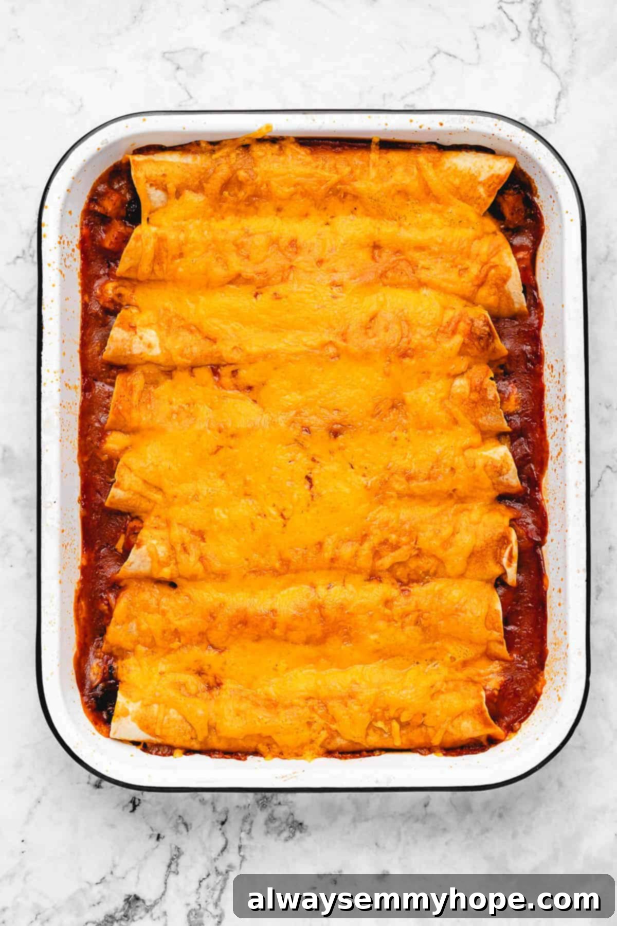 Baked vegan enchiladas in a casserole dish.