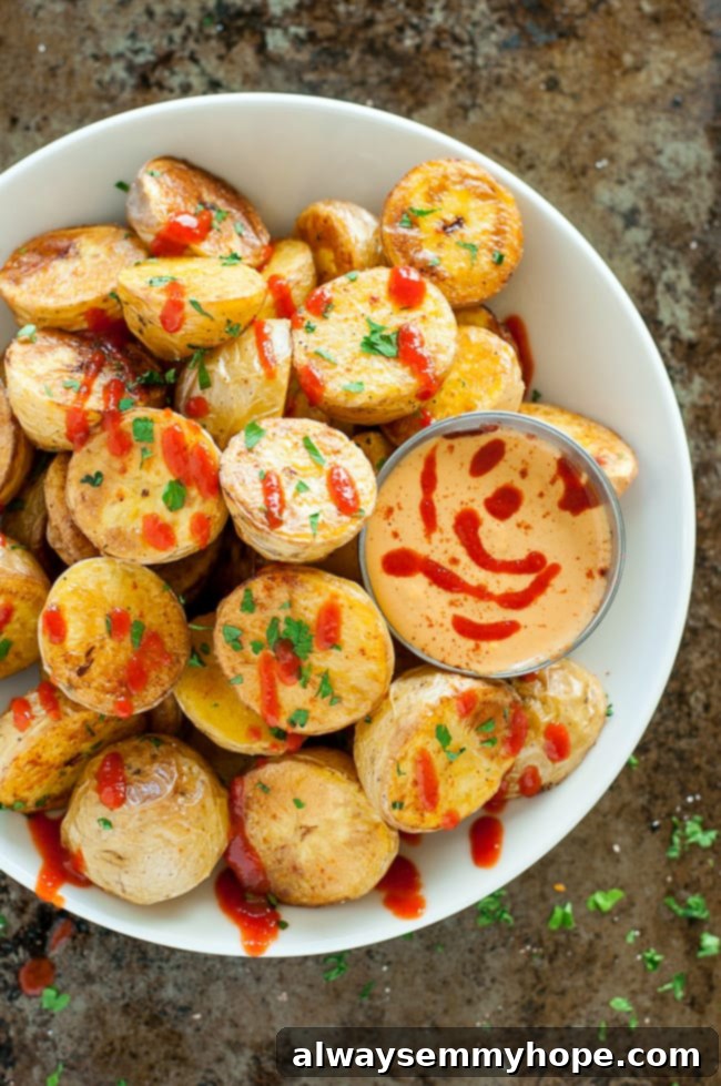 Quick Fall Vegan Dinners: 25 Recipes Ready in 15 Minutes 8 Top down shot of perfectly roasted golden potatoes on a white plate, seasoned and ready to eat.