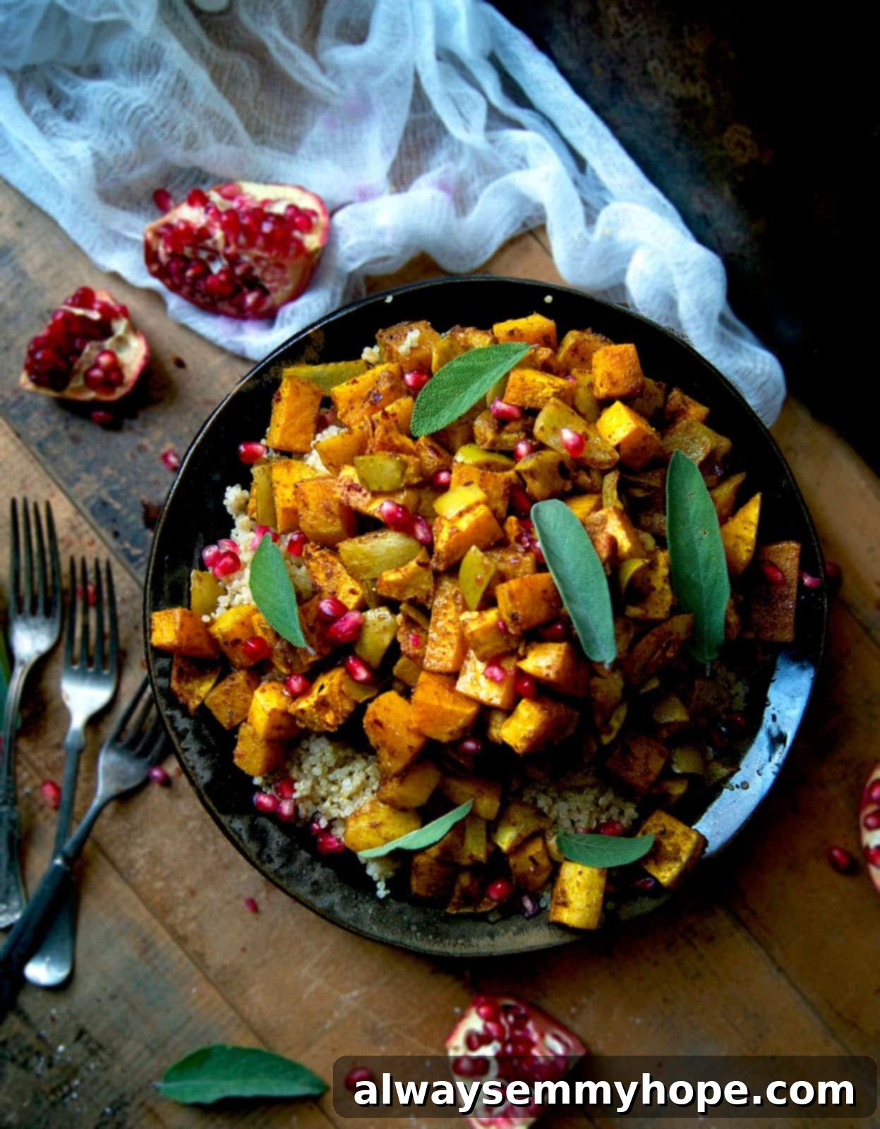 Quick Fall Vegan Dinners: 25 Recipes Ready in 15 Minutes 9 Overhead shot of a vibrant Moroccan roasted vegetable salad on a black plate.