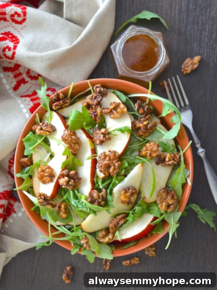Quick Fall Vegan Dinners: 25 Recipes Ready in 15 Minutes 15 Top down shot of a refreshing pear walnut salad in a brown bowl, with dressing on the side.
