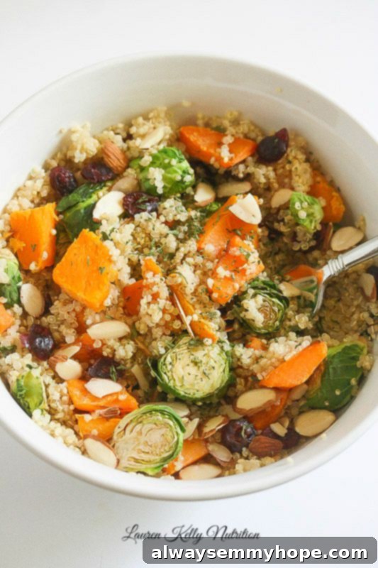 Quick Fall Vegan Dinners: 25 Recipes Ready in 15 Minutes 3 Overhead shot of a wholesome brussels sprout sweet potato quinoa bowl in a white serving dish.