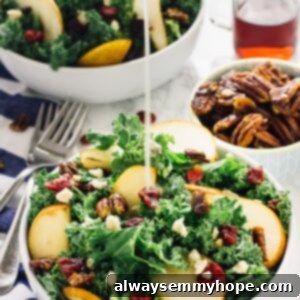 Signature Pear and Gorgonzola Salad 2 Pear gorgonzola caramelised pecans salad with dressing being poured on.