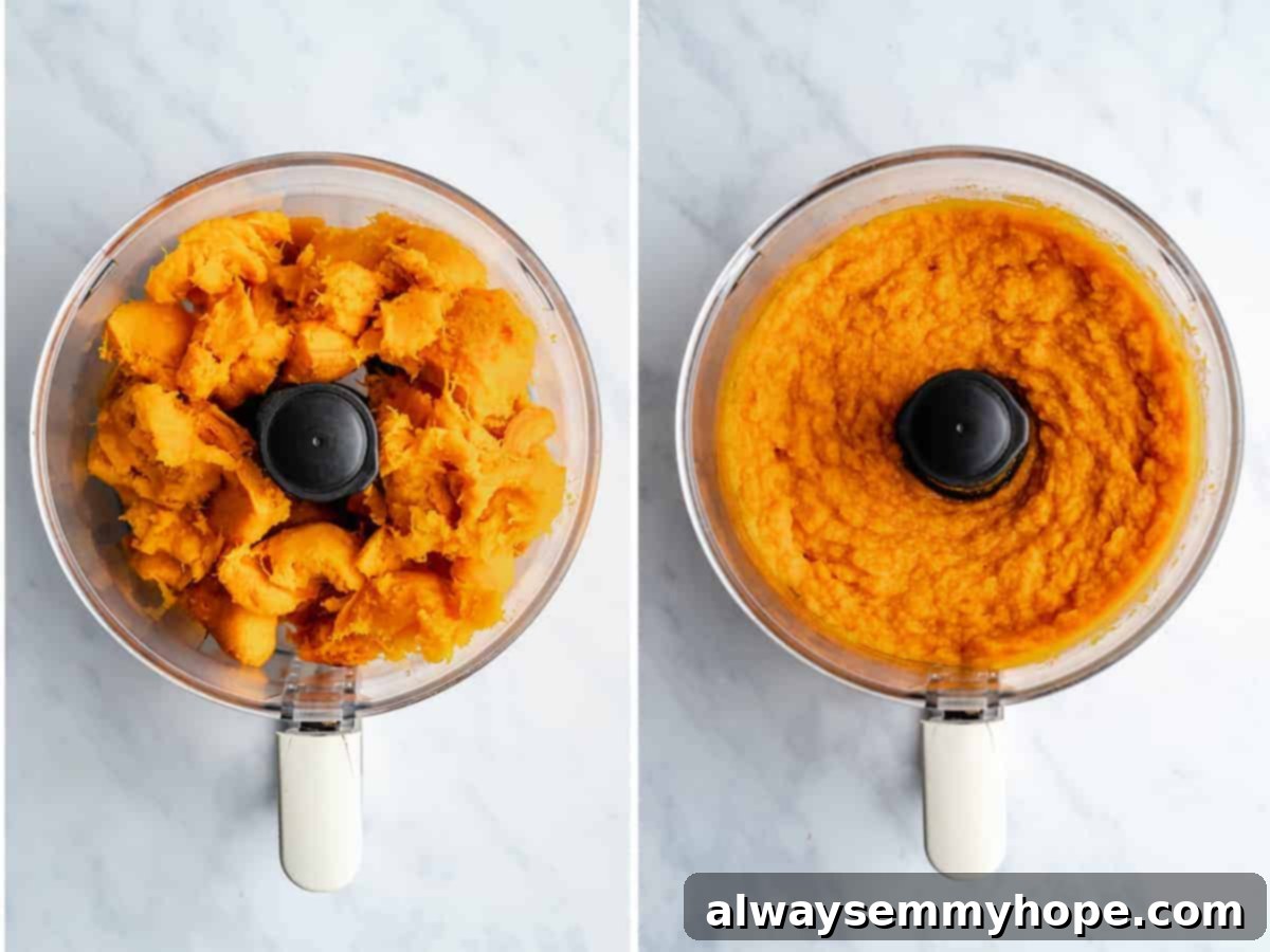 Cooked pumpkin flesh being added into a food processor for blending, a crucial step in making smooth pumpkin puree.