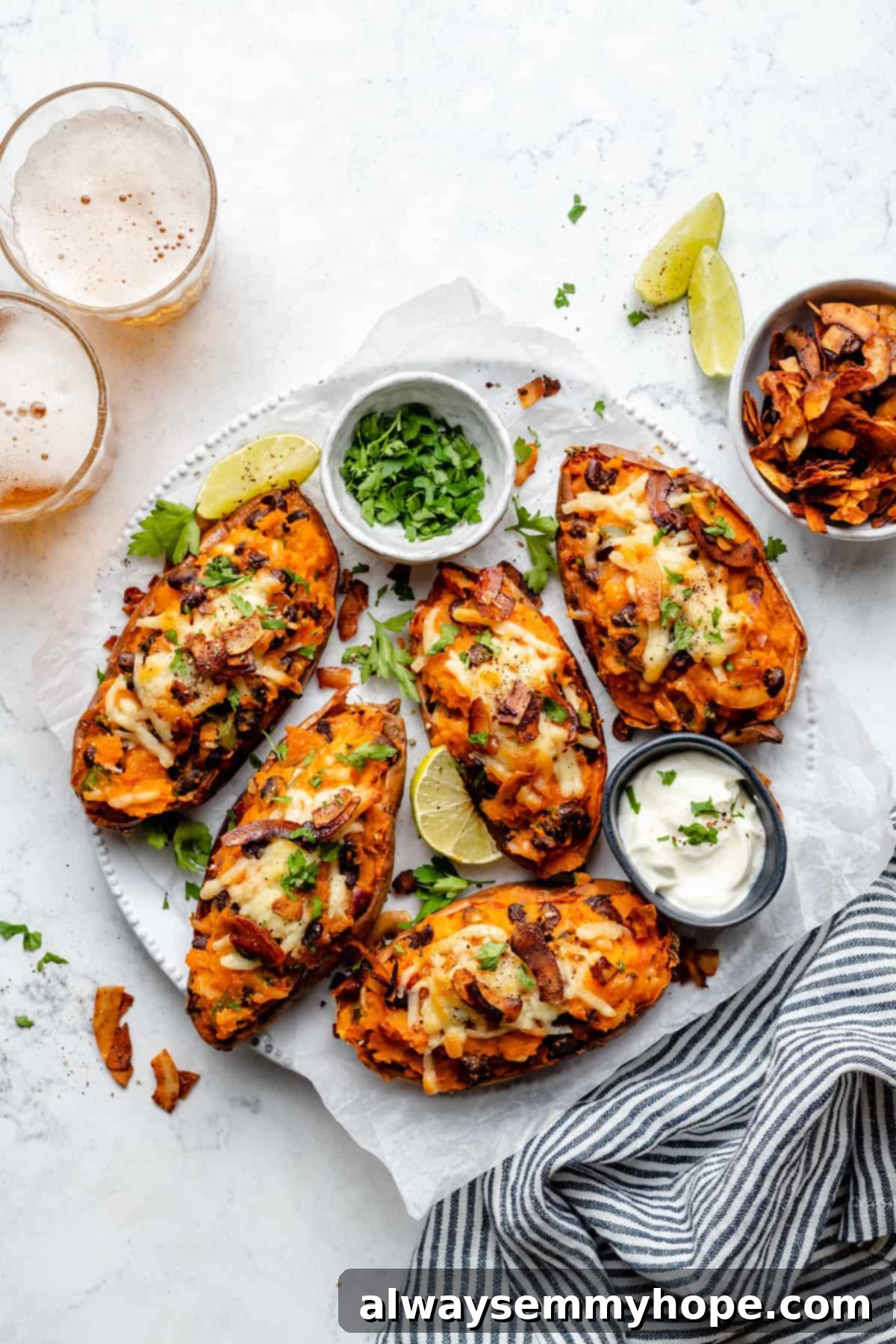 Stuffed Sweet Potato Skins 14 Overhead view of vegan sweet potato skins on plate with garnishes