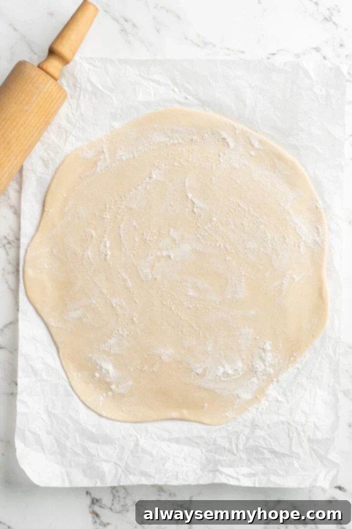 Easy 9-Ingredient Vegan Pumpkin Pie 2 pie dough rolled out to a thin circle.