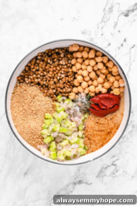 This vegan meatloaf makes a perfect Thanksgiving main dish or entree! It's moist and full of flavor, with just 15 minutes of prep. Dig in! Ingredients for vegan meatloaf combined in a large bowl.