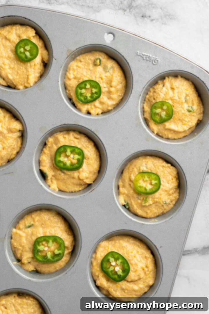 These moist vegan jalapeño cornbread muffins are easy to make and have a gluten-free option, which means everyone can enjoy them! Jalapeño cornbread muffins before baking.