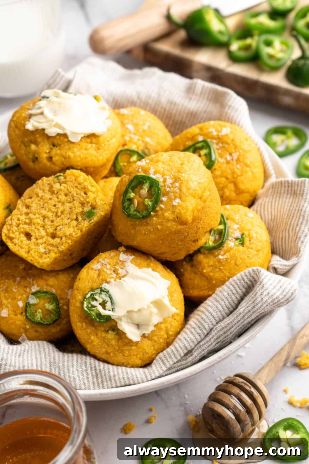 These moist vegan jalapeño cornbread muffins are easy to make and have a gluten-free option, which means everyone can enjoy them! Basket of vegan cornbread muffins.