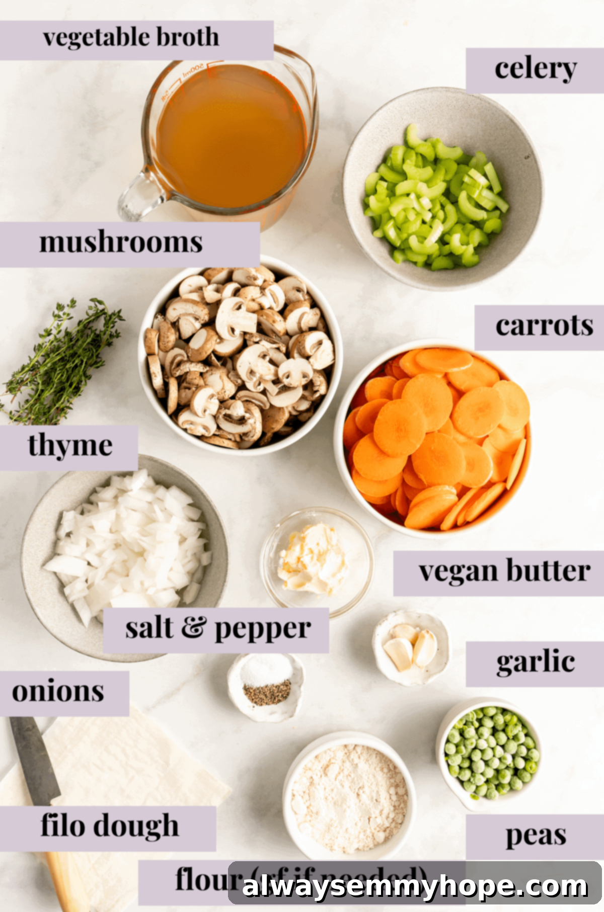 The Best Vegan Pot Pie – Easy, 1-Hour Recipe! Freshly chopped carrots, sliced mushrooms, and other raw ingredients for vegan pot pies neatly arranged in bowls on a kitchen counter.