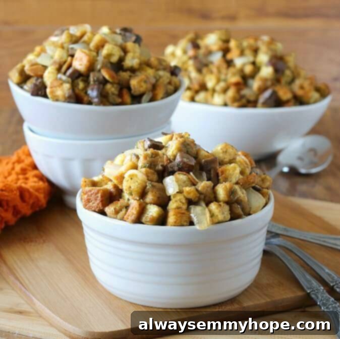 Cremini mushroom dressing in three white bowls on a wooden board. 