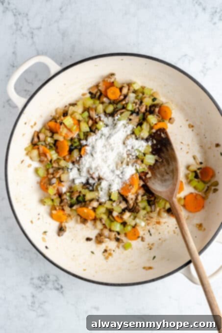 Hearty Vegan Shepherd's Pie 6 Stirring gluten-free flour into the sautéed vegetable mixture in a Dutch oven to create a roux for the Shepherd's Pie filling