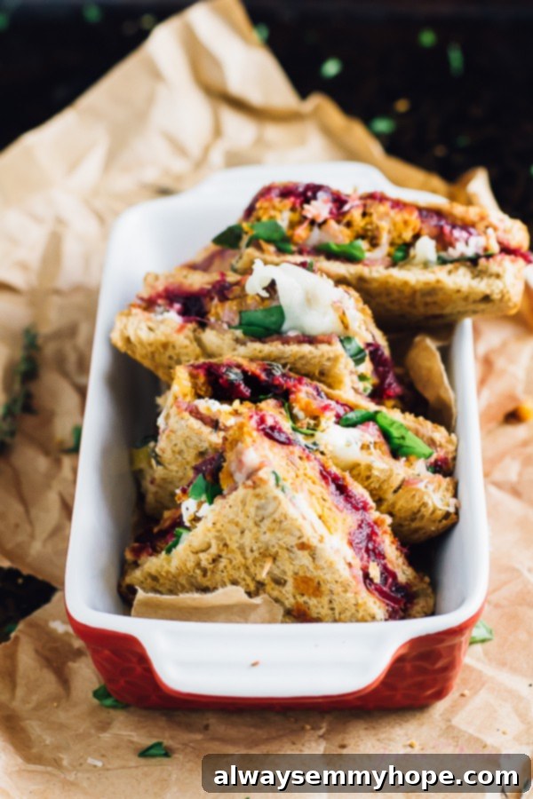 Thanksgiving's Vegetarian Encore: Meatloaf & Cranberry Sandwich 5 A red baking dish containing slices of vegetarian meatloaf sandwich.