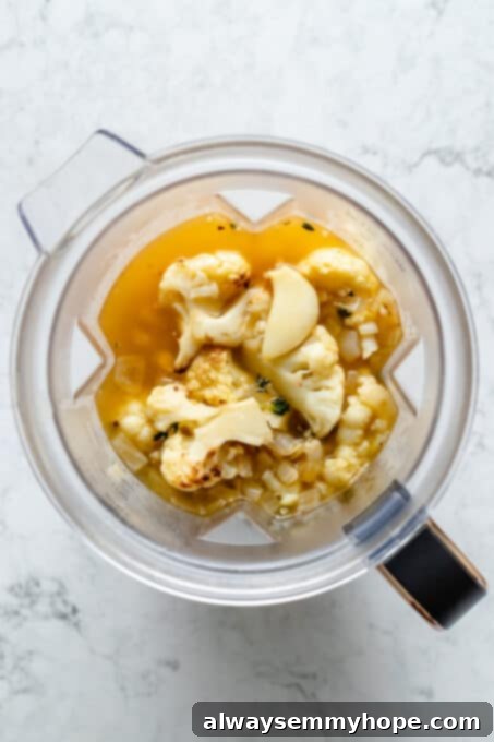 Velvety Roasted Cauliflower Soup 9 Overhead view of cauliflower soup ingredients in blender