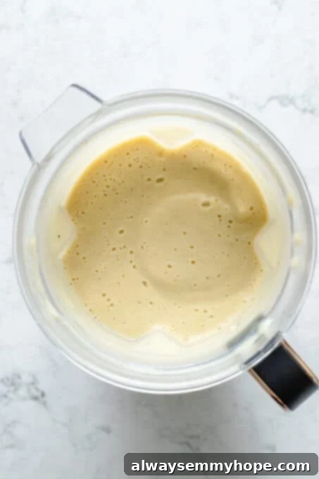 Velvety Roasted Cauliflower Soup 10 Overhead view of cauliflower soup in blender