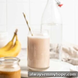 Banana milk in jar with straw