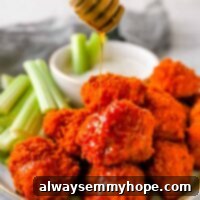 Easy Buffalo Cauliflower Wings 2 buffalo cauliflower wings on a plate