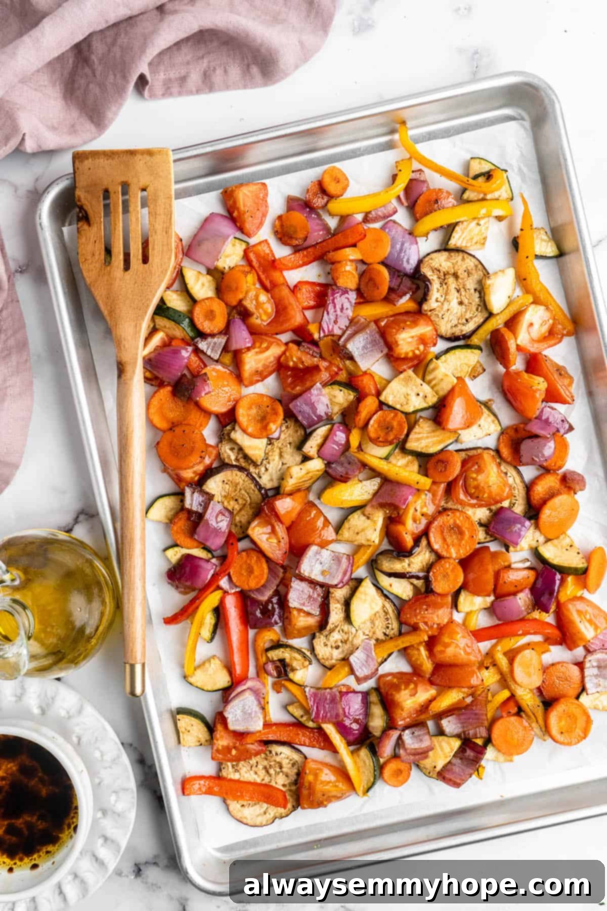 Easy Balsamic Roasted Vegetables 2 A vibrant sheet pan overflowing with perfectly roasted balsamic vegetables, showcasing their tender and caramelized texture. Ideal for healthy meal prep and easy dinners.