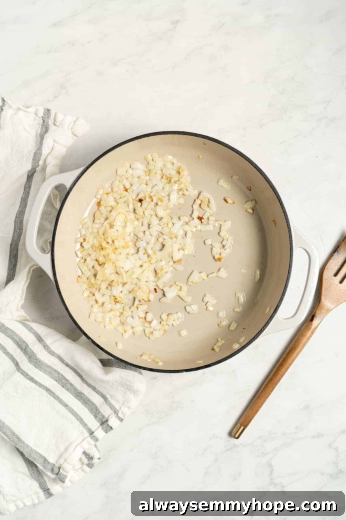 Diced garlic and onion gently sautéing in a hot skillet, releasing their aromas.