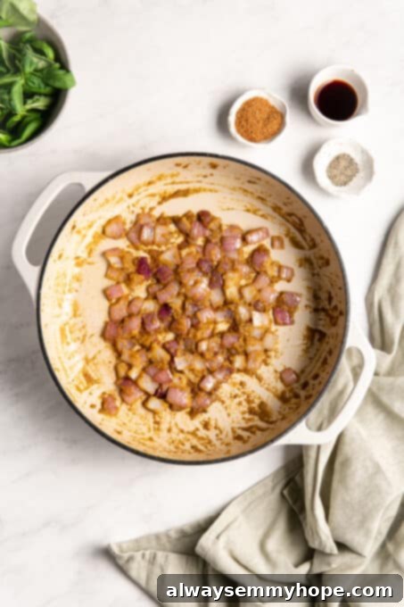 Effortless Thai Green Curry 6 Beautifully sautéed red onion mixed with fragrant fried curry paste, forming the foundation of the curry.