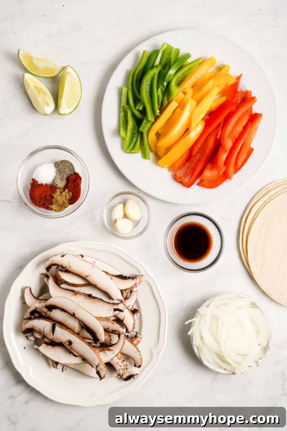 Meaty portobello mushrooms make the best vegan fajitas, sautéed with tender bell peppers and homemade fajita seasoning. Ready in 30 minutes! Ingredients for vegan fajitas.