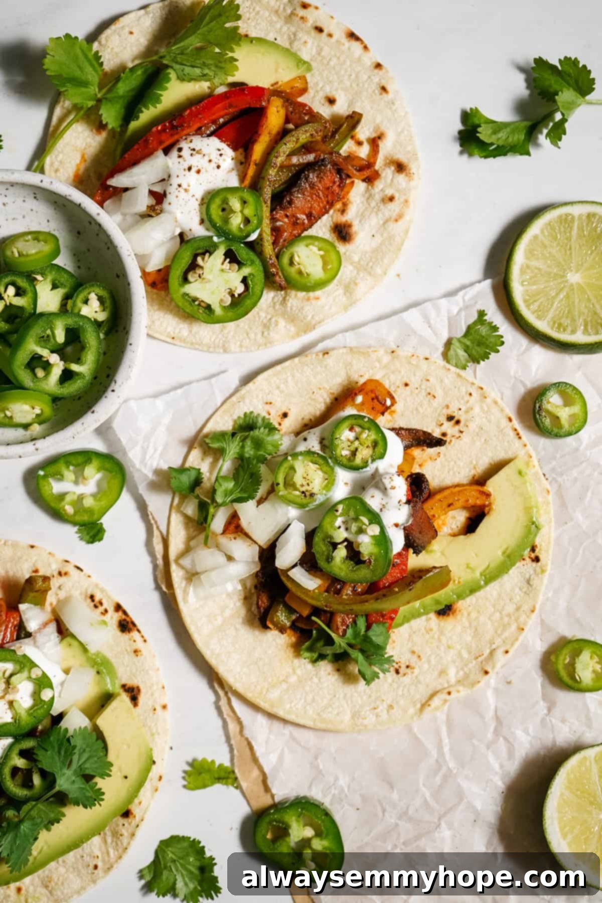 Meaty portobello mushrooms make the best vegan fajitas, sautéed with tender bell peppers and homemade fajita seasoning. Ready in 30 minutes! Mushroom vegan fajitas with bell pepper and avocado.