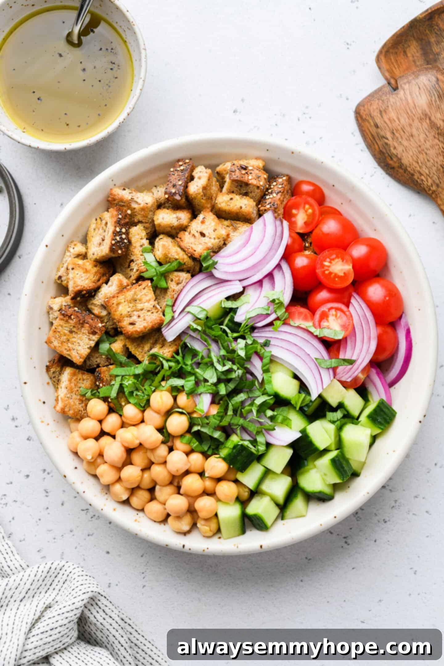 Rustic Chickpea Panzanella 4 Chickpea panzanella salad in glass mixing bowl