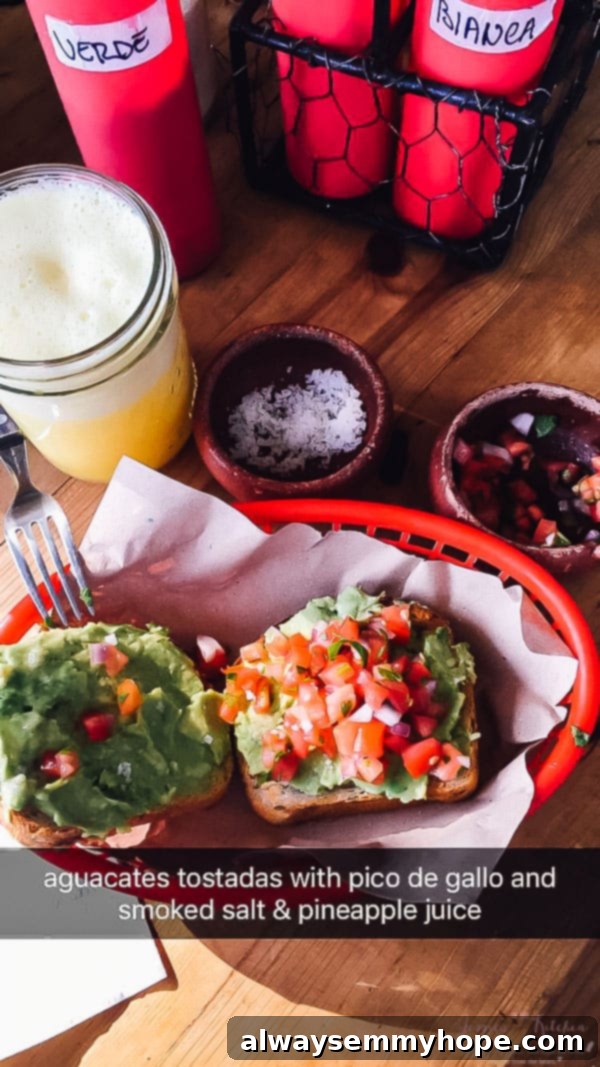Tulum Eats Your Essential Food and City Guide 5 Avocado on toast in a red basket.
