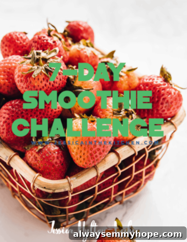 Seven Day Smoothie Reset Win A Prize 3 Green text overlay on a close-up image of a basket overflowing with fresh, plump, red strawberries, symbolizing the fresh, natural ingredients used in our healthy smoothie recipes.