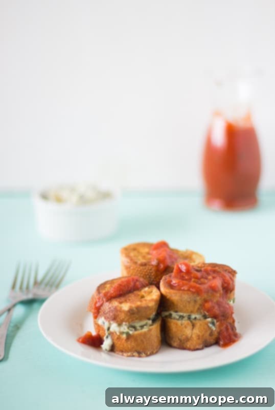 Roasted tomatoes produce an absolutely delicious home-made version of sun-dried tomatoes, resulting in Homemade Sundried Tomatoes Bruschetta. Italian Style Stuffed French Toast on a white dish.