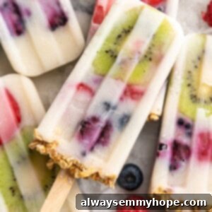 Frozen Yogurt Delights 2 Pile of yogurt popsicles with fruit and granola