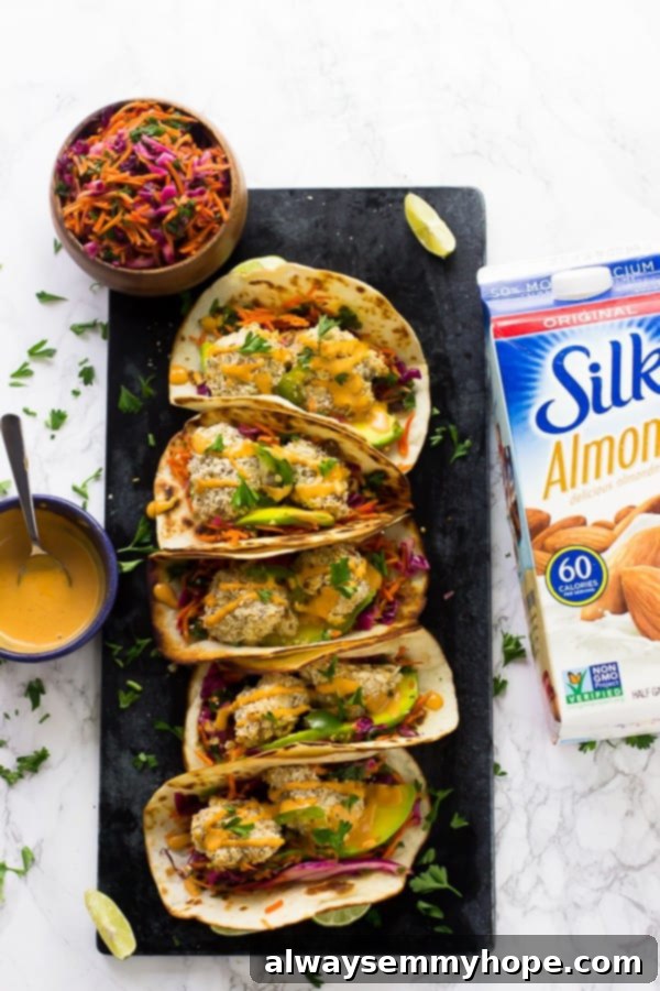Top down view of cauliflower tacos on a gray slate. 