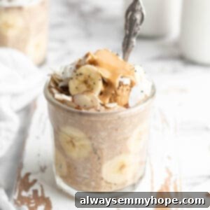 Peanut butter banana overnight oats in jar with spoon
