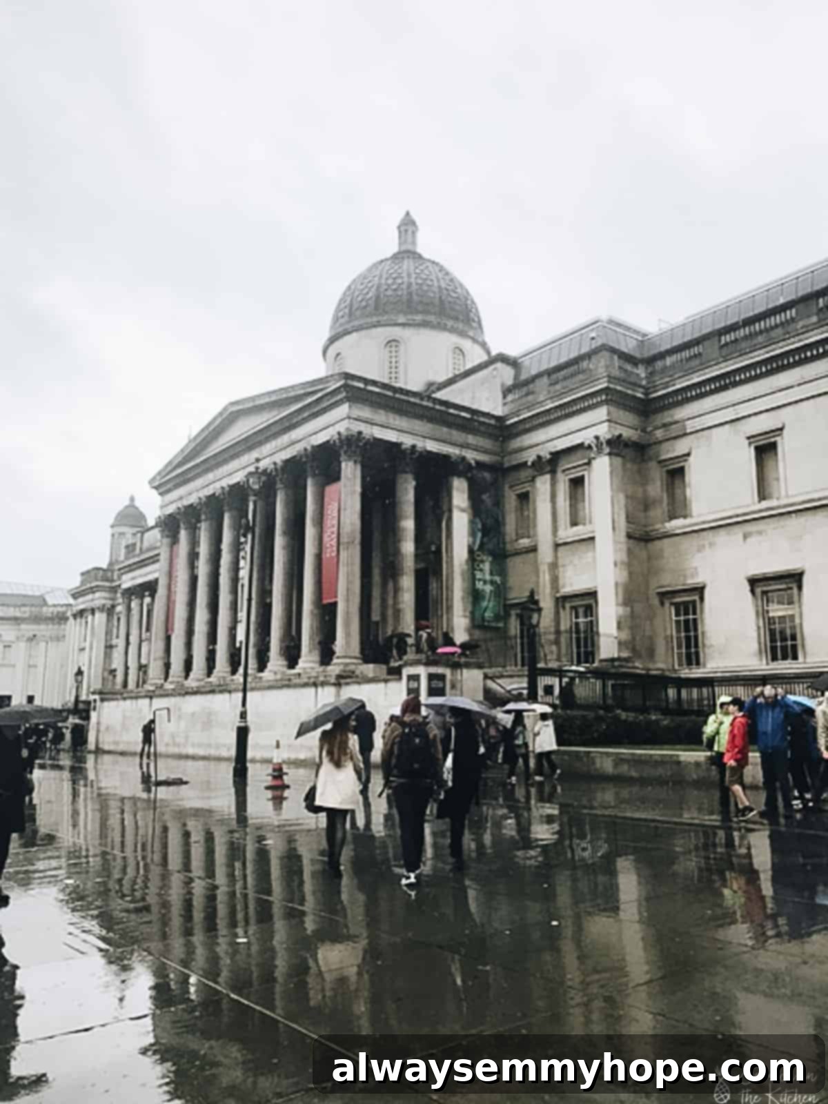 Your Essential Guide to London Food and Exploration 23 Exterior shot of the magnificent National Gallery in London, seen on a rainy day.