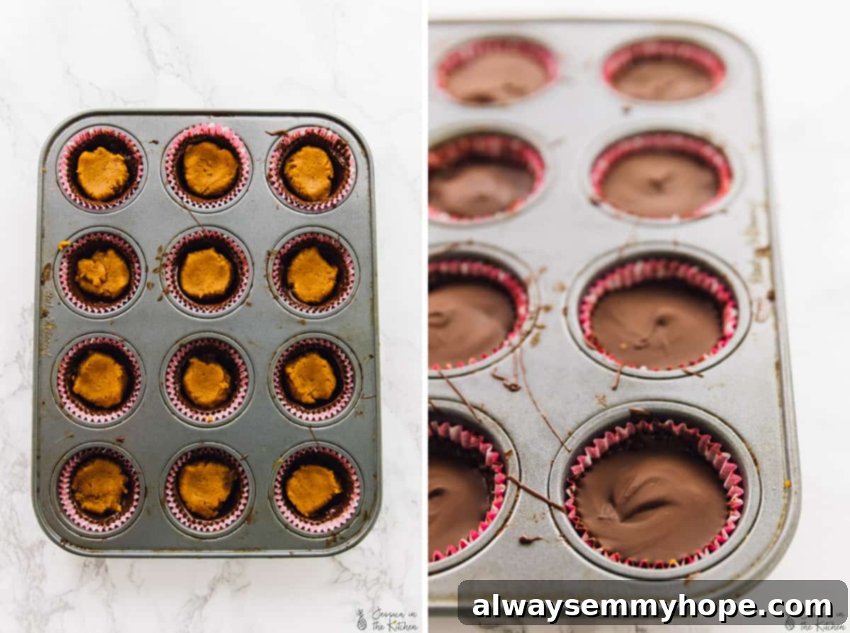 Pumpkin chocolate cups arranged neatly in a muffin tray, ready to set.