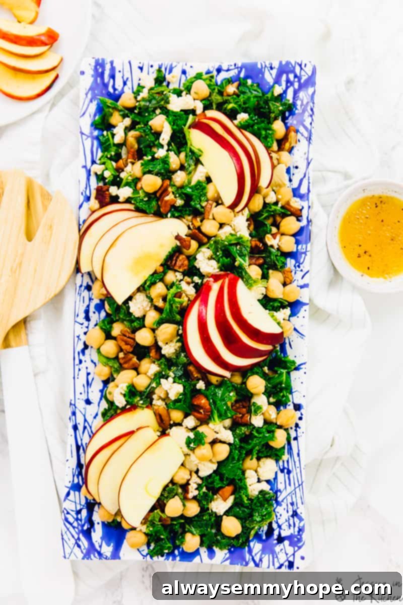 Overhead shot of chickpea salad on a long blue plate.