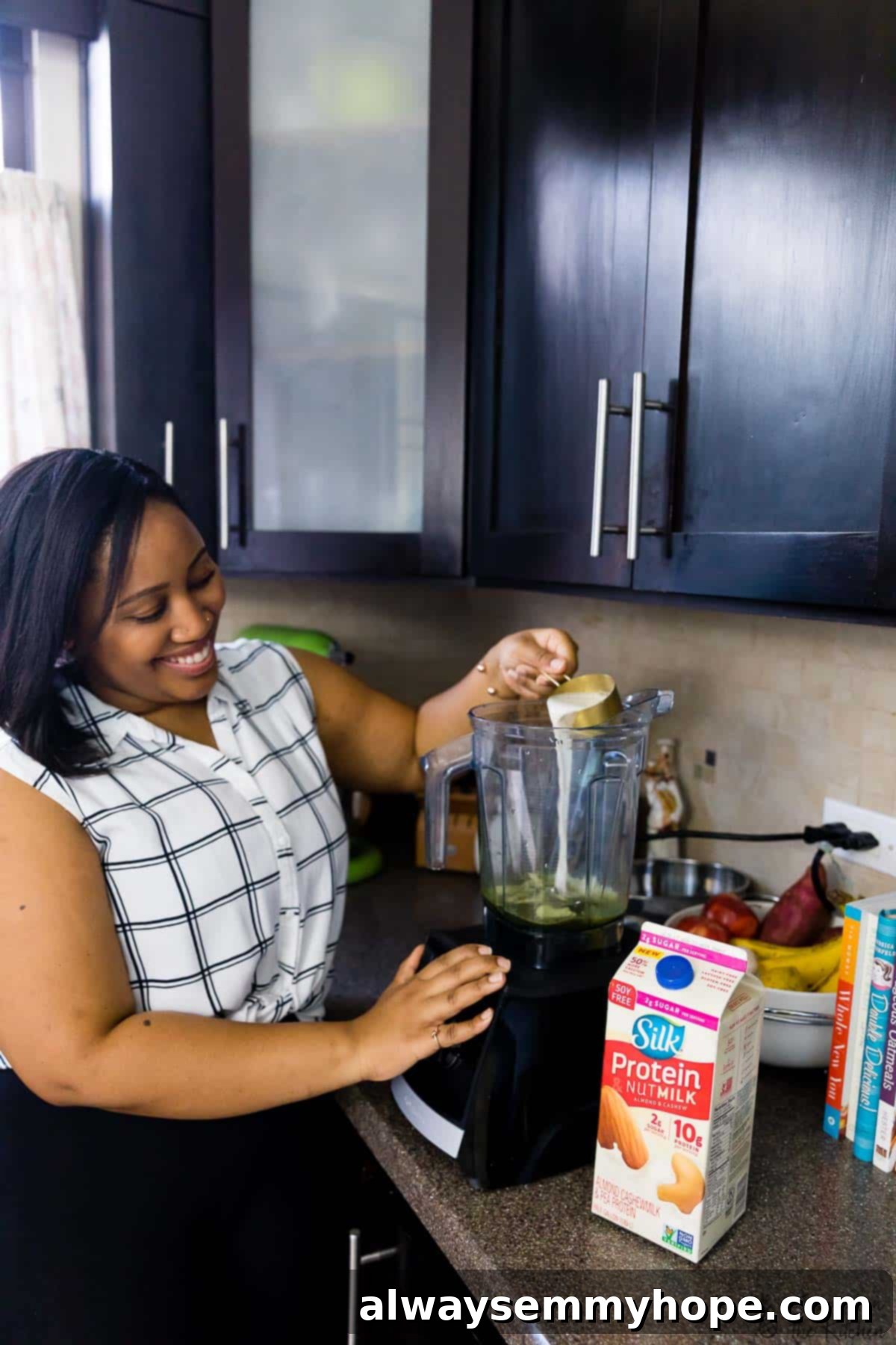 My Progress Morning Routine Featuring Quinoa Breakfast Bars 8 Jessica preparing her vibrant matcha latte, a healthy and energizing part of her morning routine.
