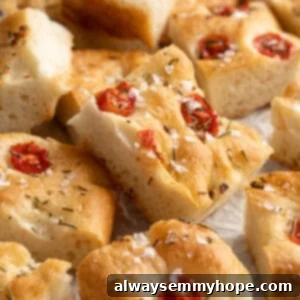 Pile of gluten-free focaccia on parchment paper