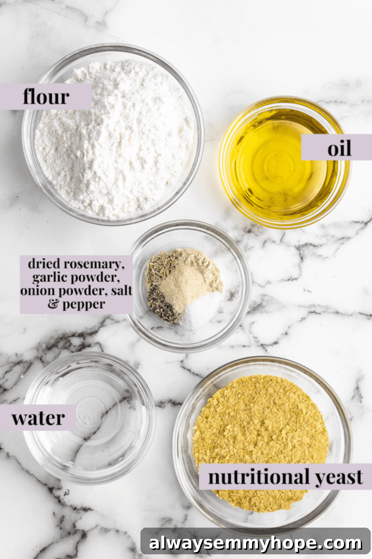 These vegan Cheez-Its are crispy, crunchy, snackable, and super cheesy! Make your own homemade vegan cheese crackers in just 30 minutes. Overhead view of ingredients for vegan cheez-its, with labels