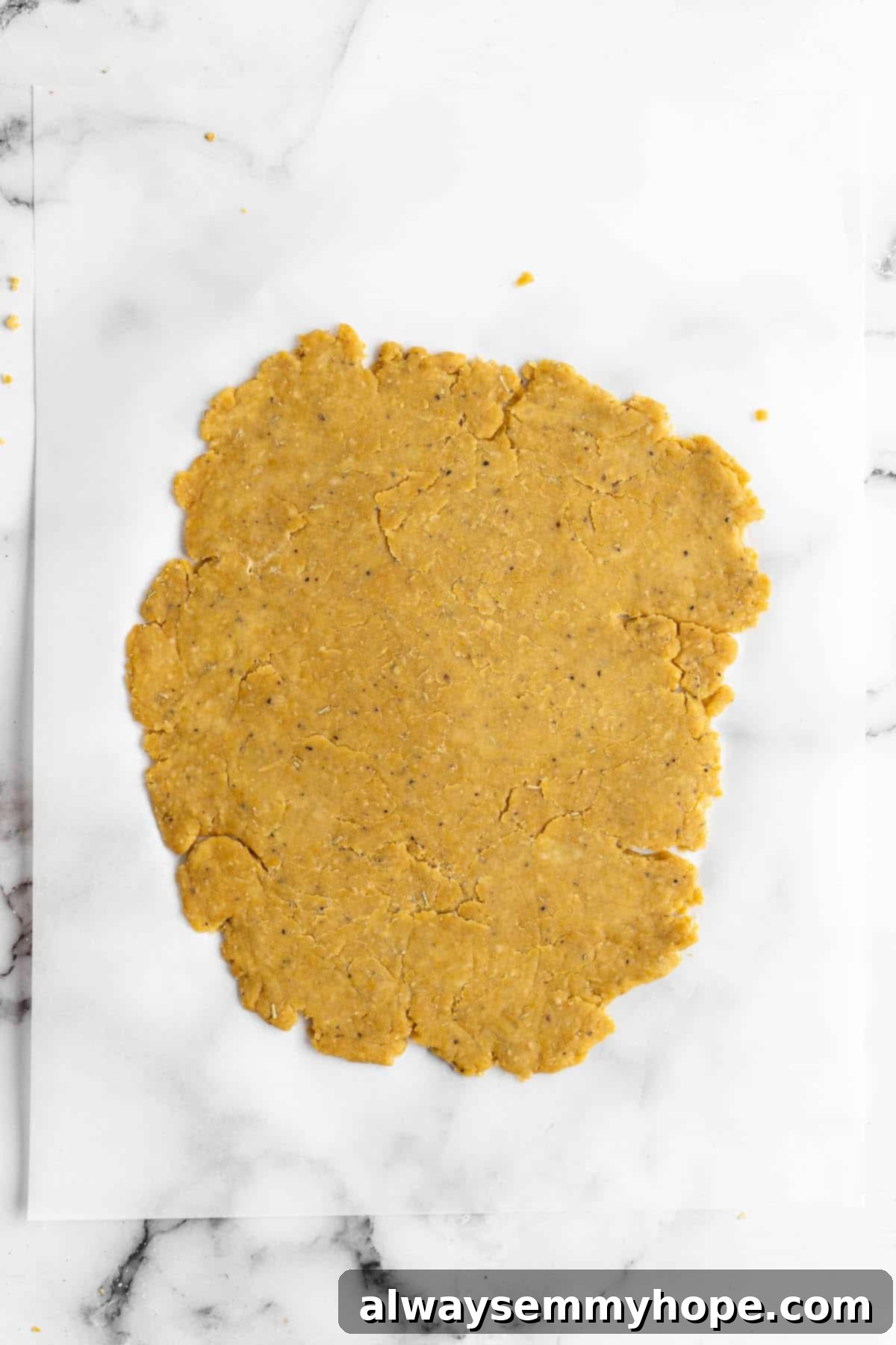 These vegan Cheez-Its are crispy, crunchy, snackable, and super cheesy! Make your own homemade vegan cheese crackers in just 30 minutes. Overhead view of vegan cheese cracker dough