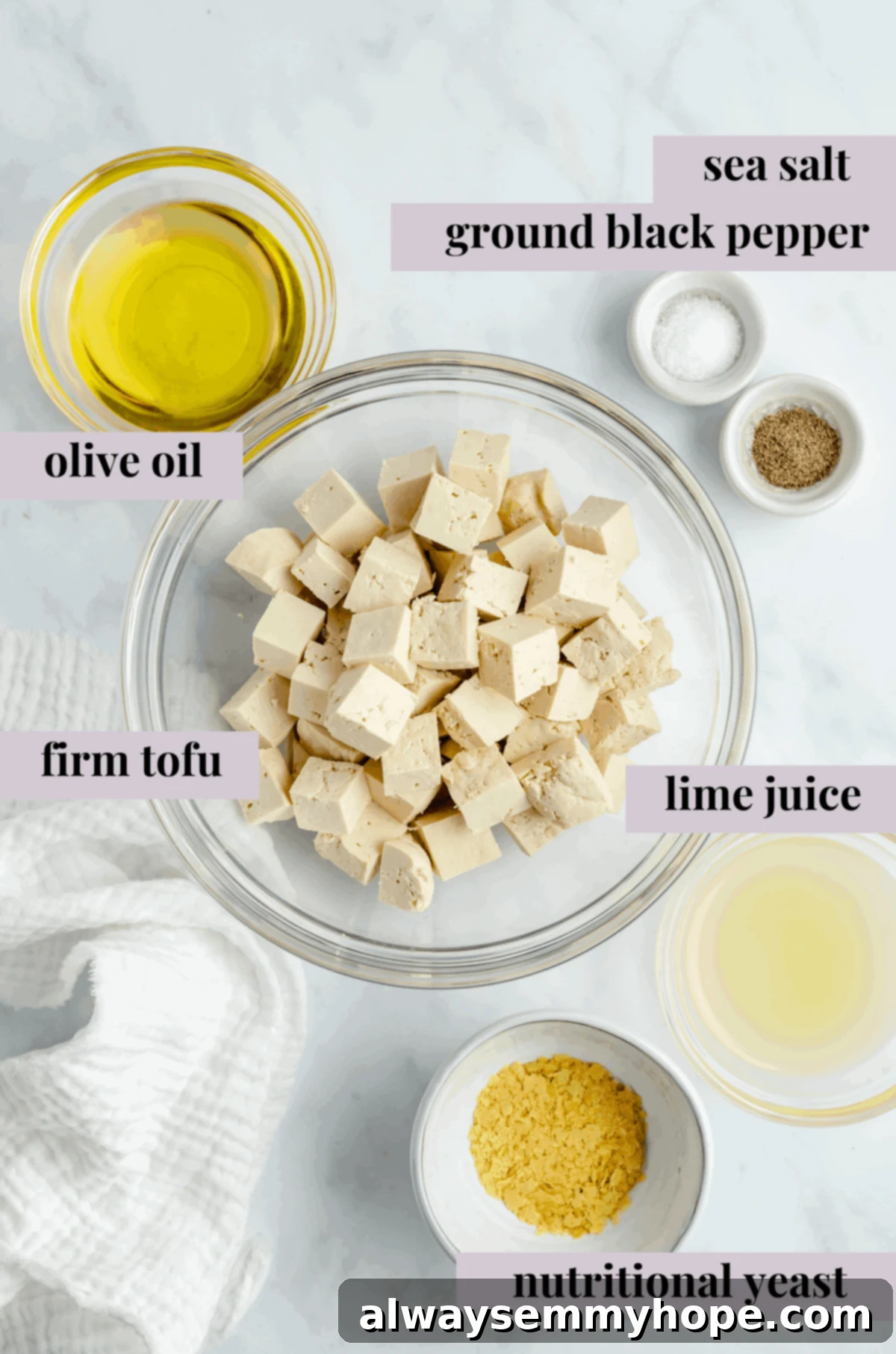 Vegan tofu feta cheese is a quick and easy plant-based substitute that needs only 6 ingredients. Enjoy it on salads, sandwiches, and more! ingredients for vegan feta cheese