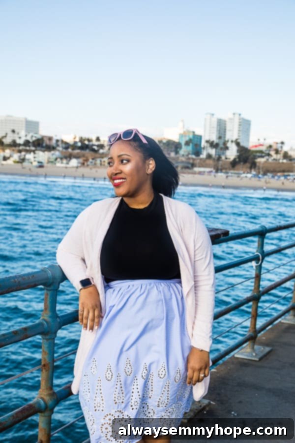 5 Weeks, 5 Lessons: A California Reflection 3 Jessica leaning against a railing by a scenic river, enjoying a peaceful moment.