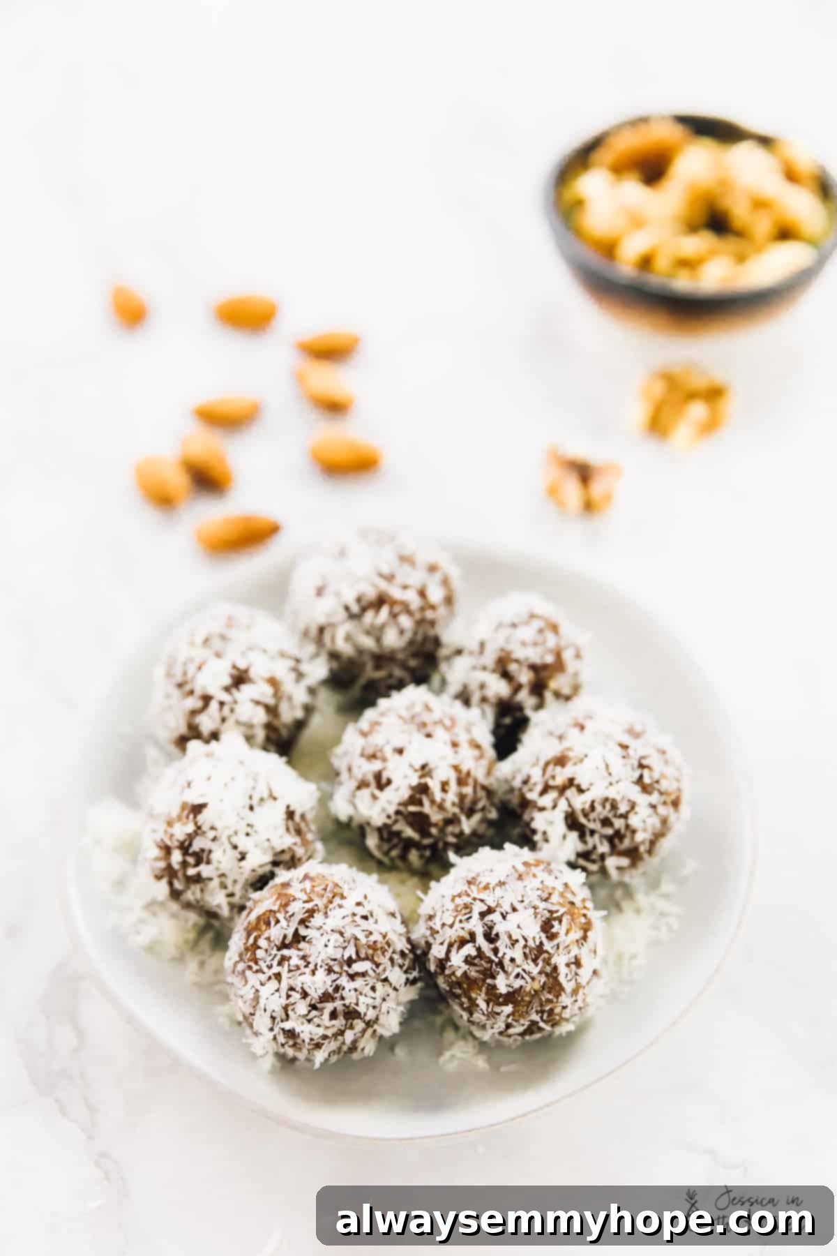 Quick and Zesty Vegan Coconut Lemon Energy Bites 5 Coconut energy bites arranged aesthetically on a white plate, ready to be enjoyed as a healthy snack.