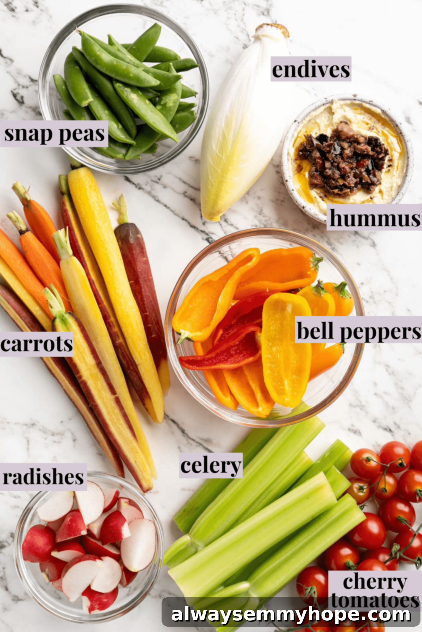 This simple tutorial will show you how to make a perfect vegetable crudité platter that's sure to impress your guests. So easy! Overhead view of ingredients for crudité platter