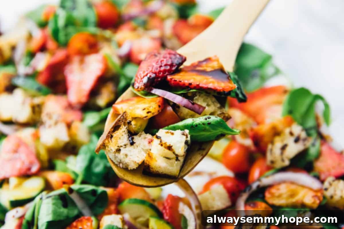 This Strawberry Panzanella Salad is incredibly delicious and easy to make, with only 6 main ingredients. It's perfect for any gathering, party, or as a delightful lunch or dinner option. A versatile vegan and gluten-free summer salad!