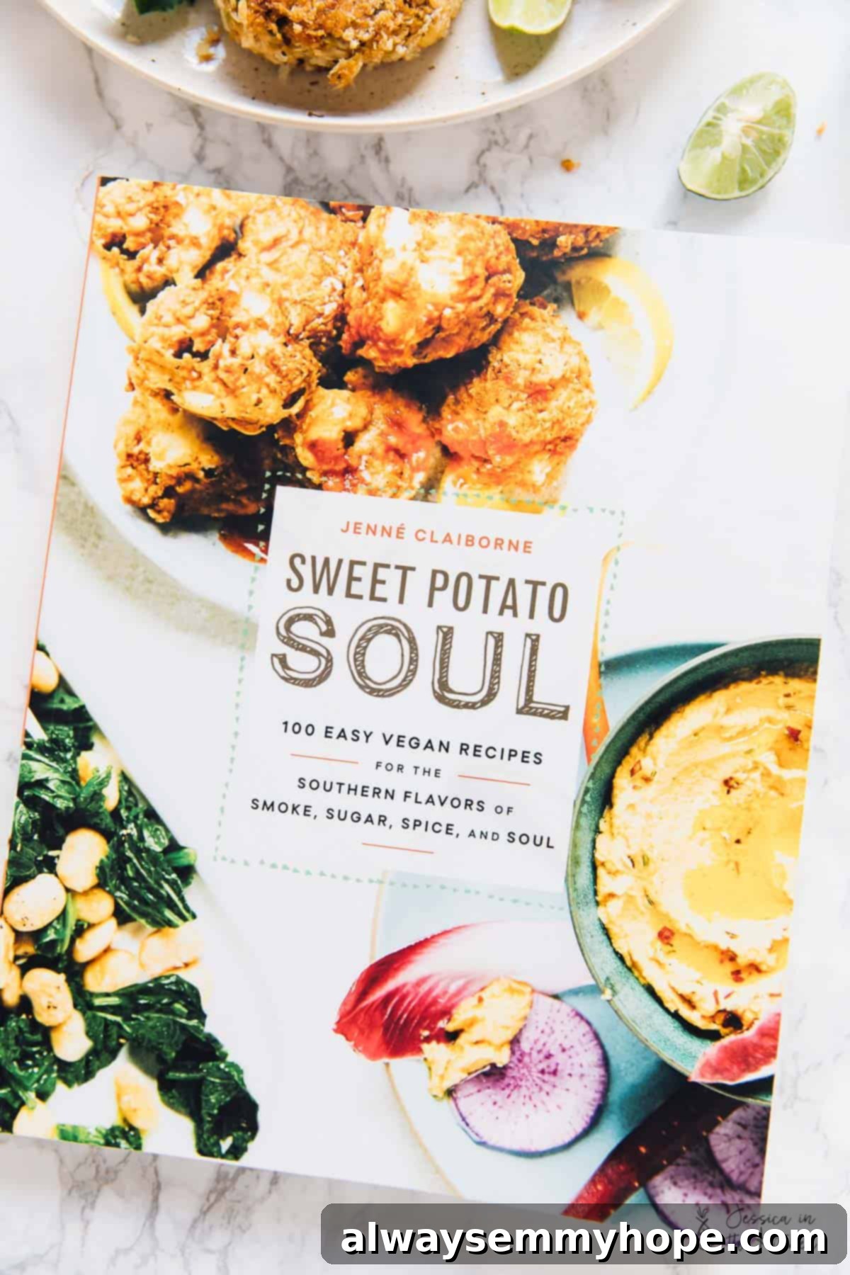 Top down view of a cook book on a table.